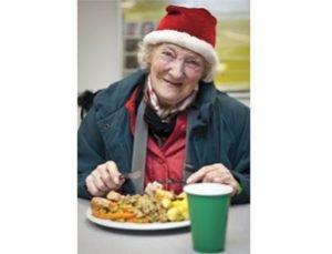 old lady eating christmas dinner
